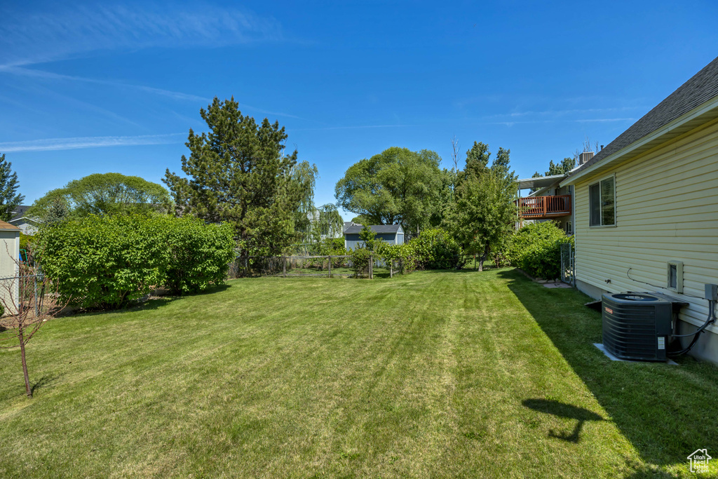 View of yard featuring central AC
