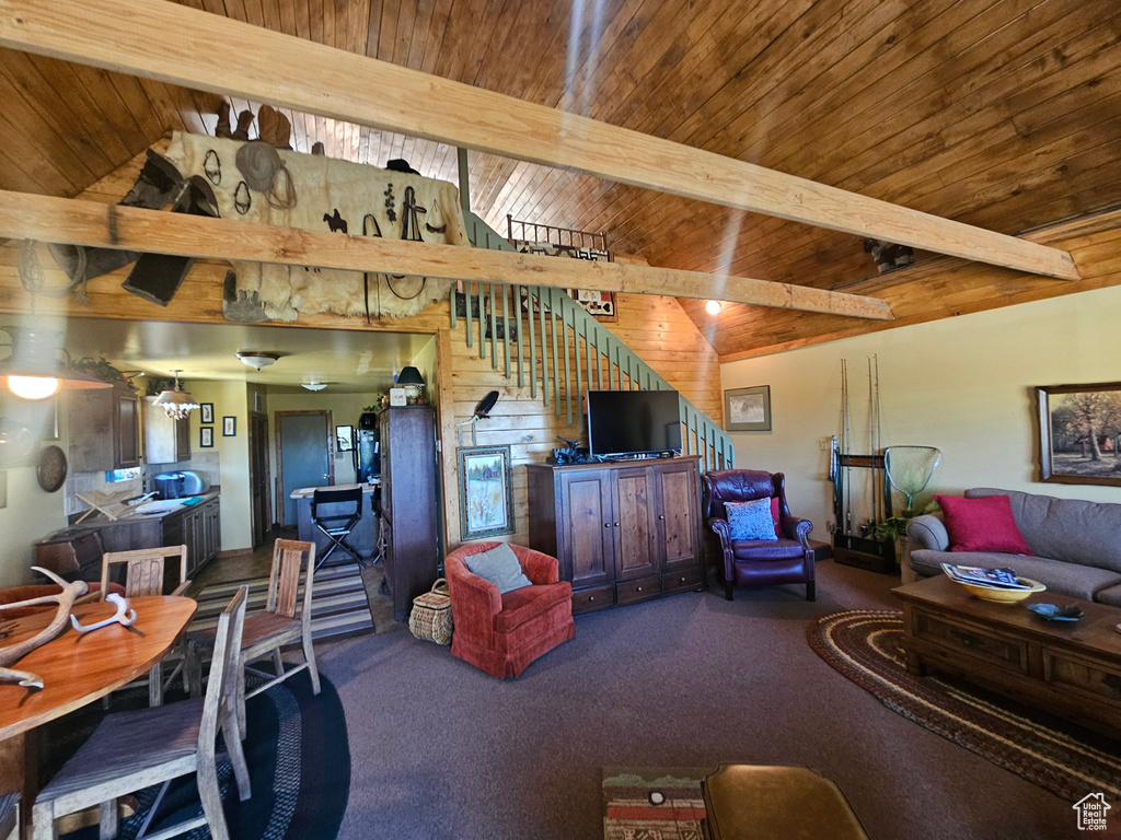 Living room with carpet flooring and wood ceiling
