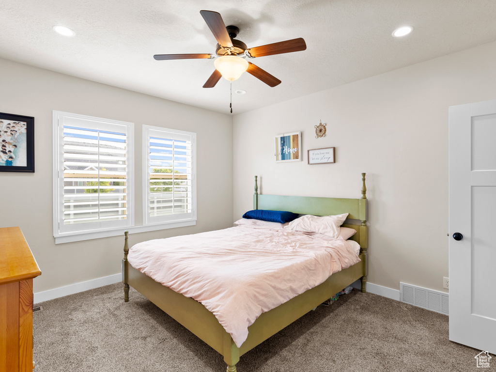 Bedroom featuring carpet flooring, recessed lighting, baseboards, and ceiling fan
