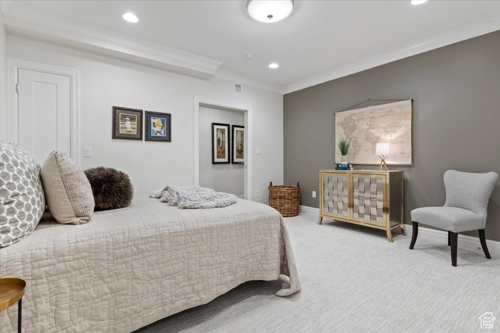 Bedroom featuring crown molding, baseboards, carpet floors, and recessed lighting