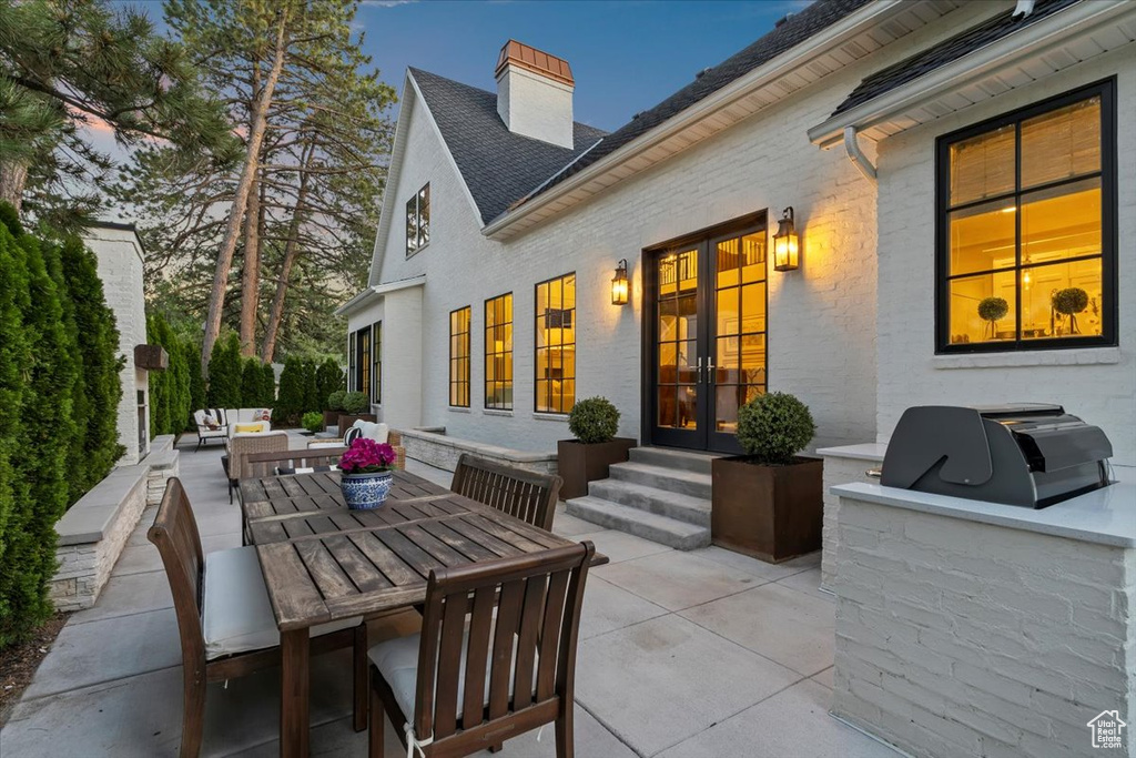 View of patio / terrace with french doors, an outdoor hangout area, and outdoor dining area