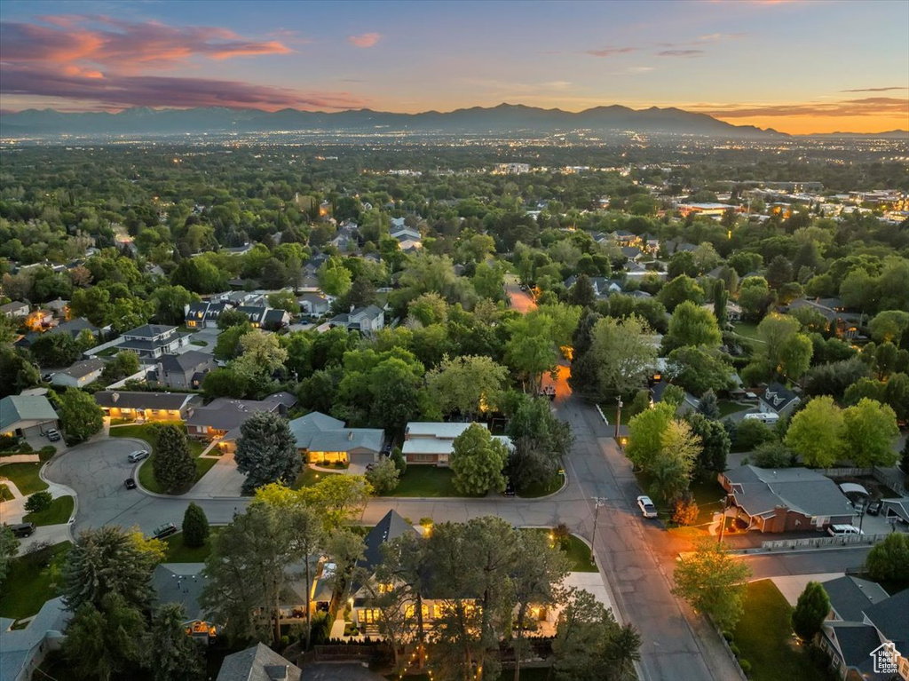 Aerial view at dusk of a mountain view and a residential view