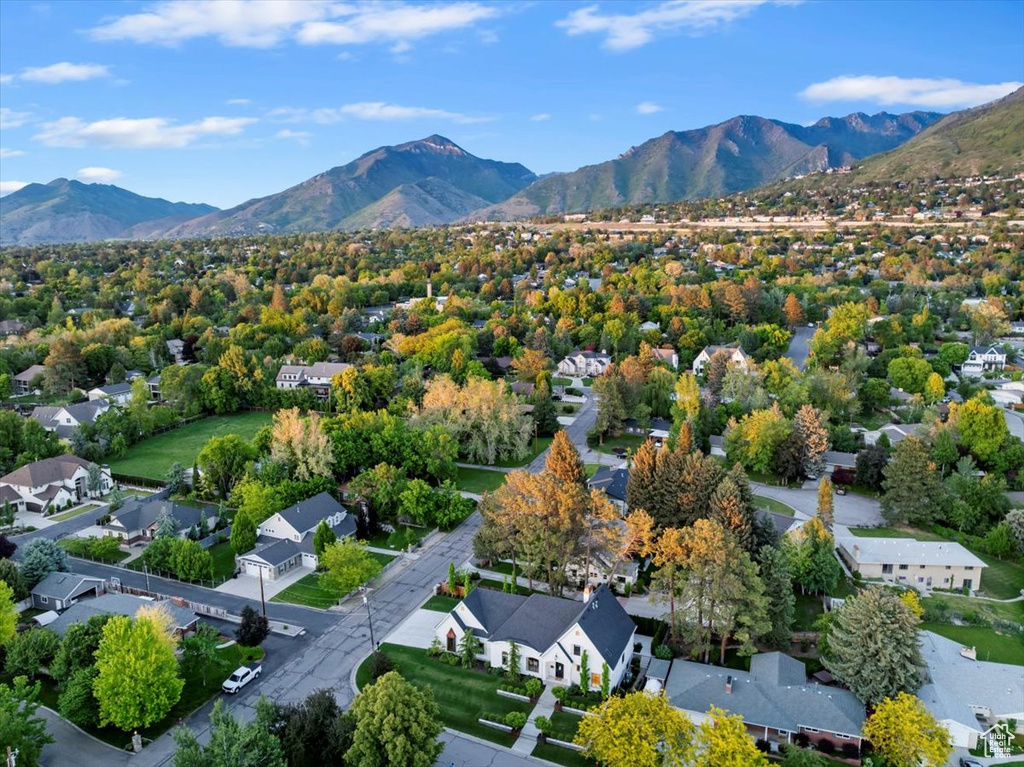 Aerial view of residential area with a mountain backdrop