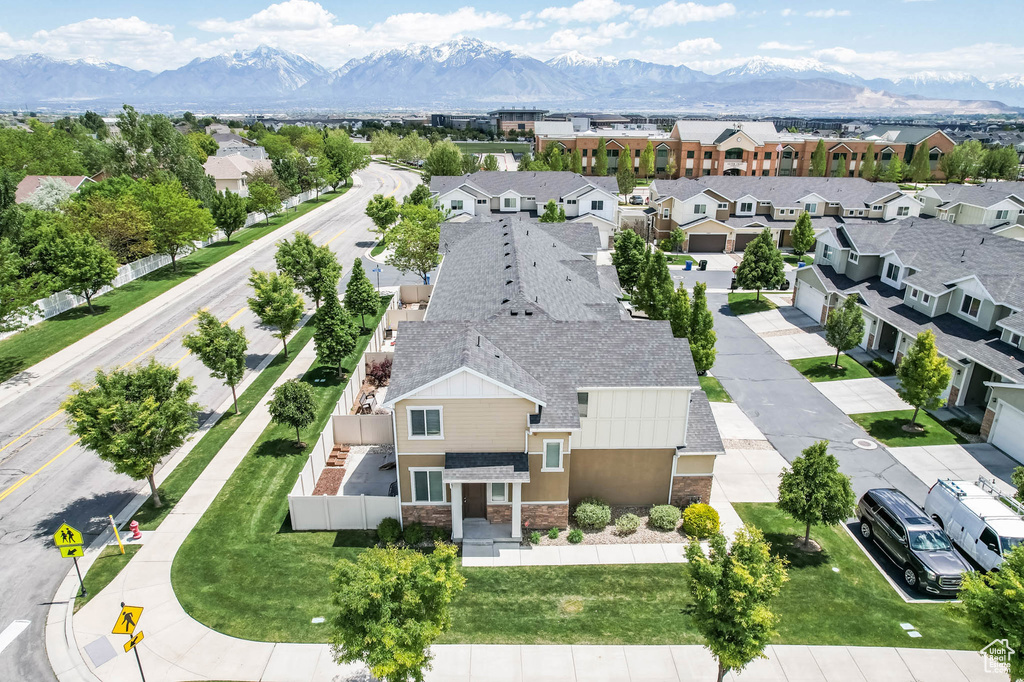 Aerial perspective of suburban area with mountains