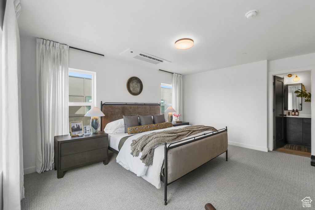 Bedroom with carpet and baseboards