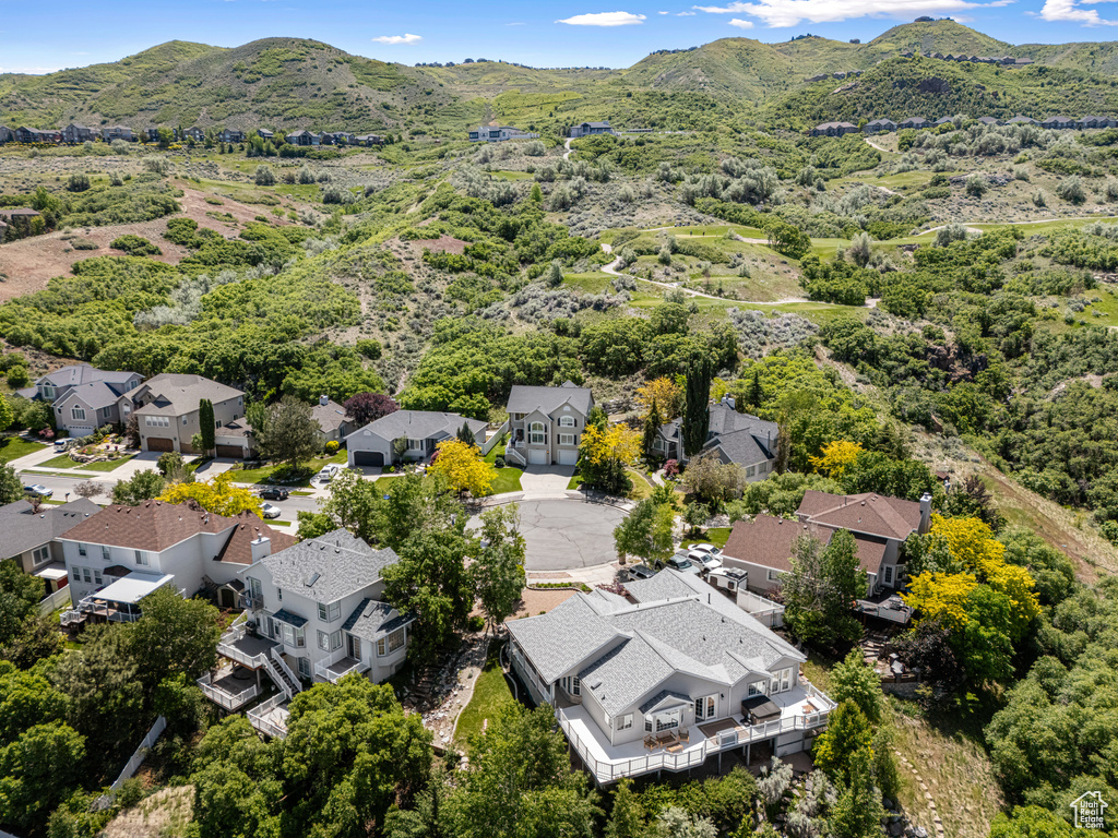 Aerial perspective of suburban area featuring mountains
