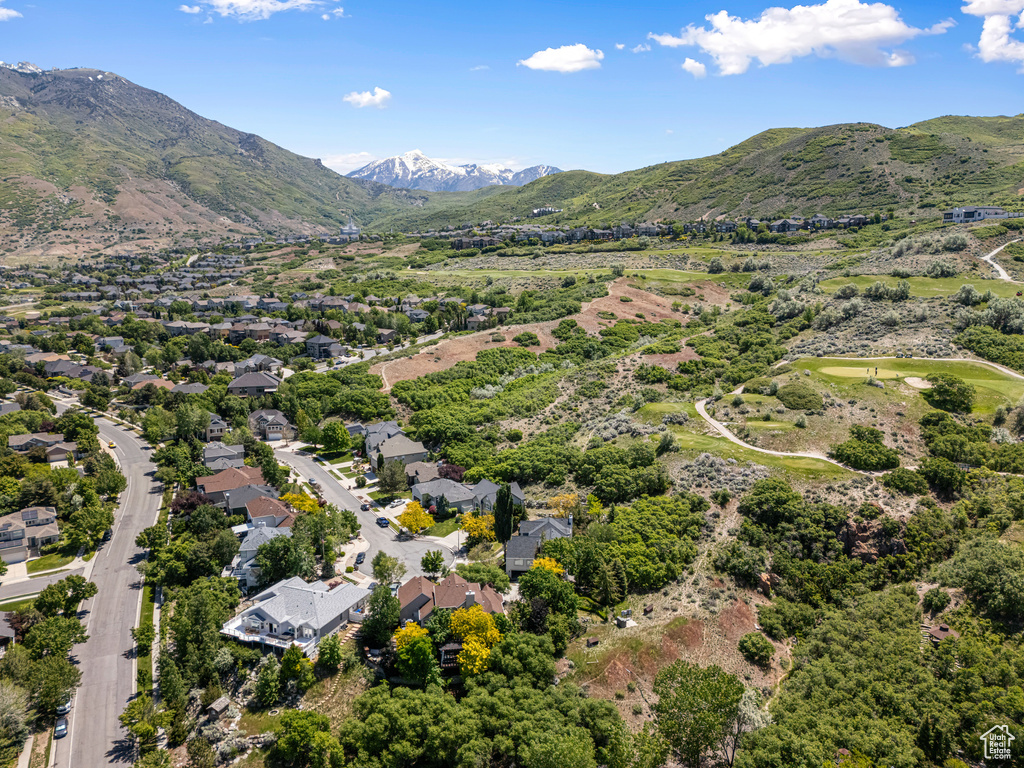 Aerial view of residential area with mountains
