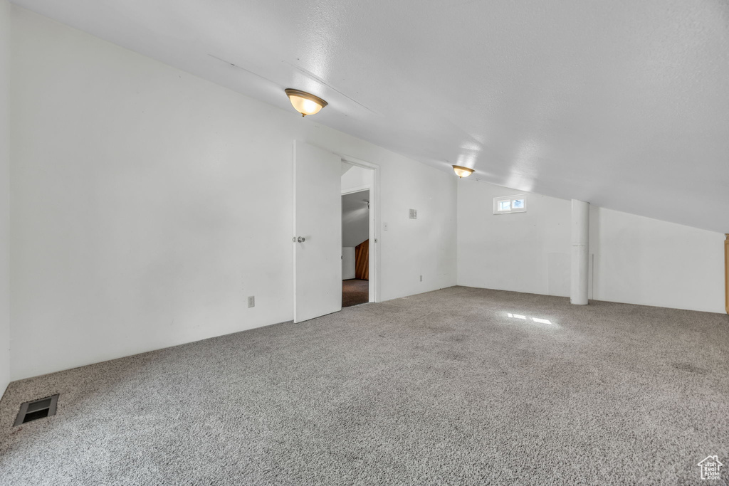 Empty room featuring carpet floors