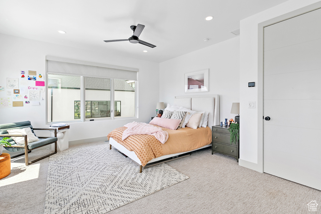 Bedroom featuring carpet floors, recessed lighting, ceiling fan, and baseboards