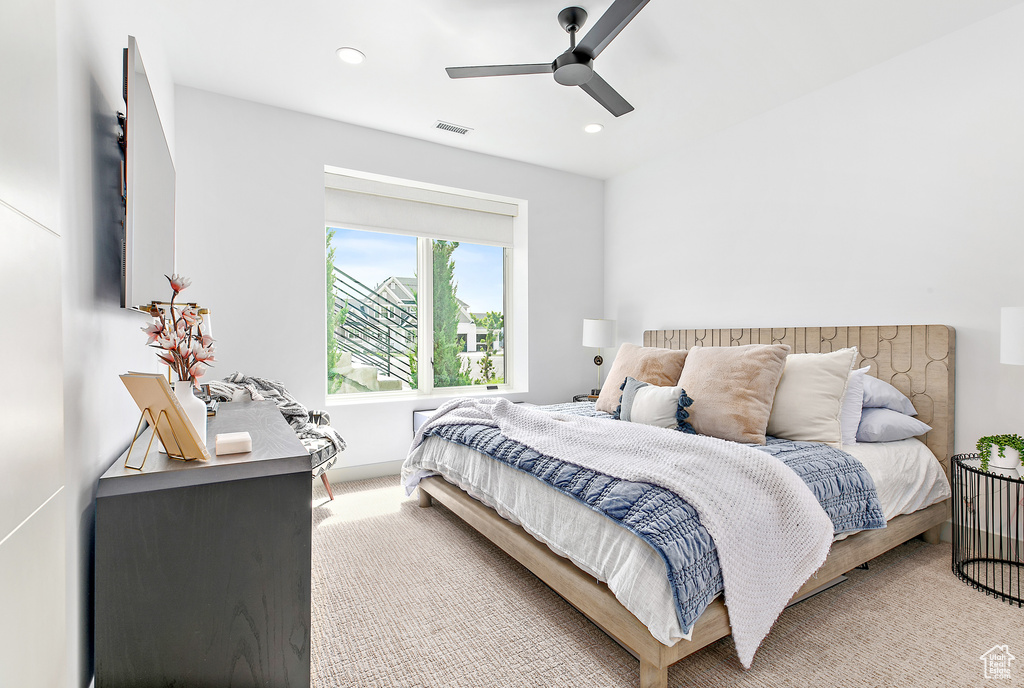 Bedroom with recessed lighting and a ceiling fan