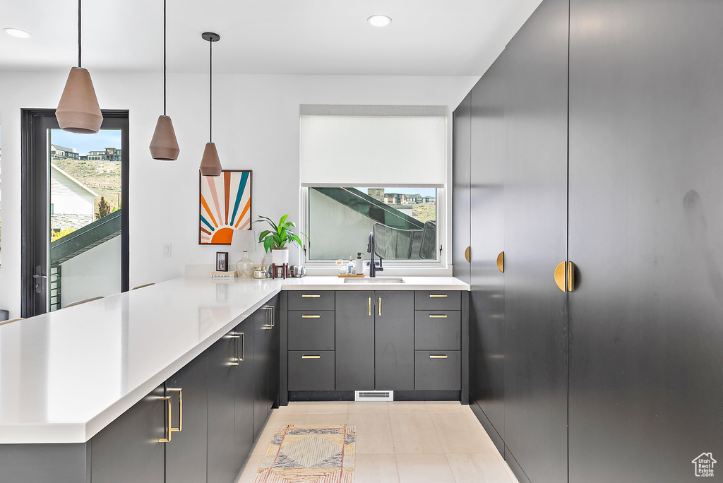 Bathroom with recessed lighting, tile patterned floors, and vanity