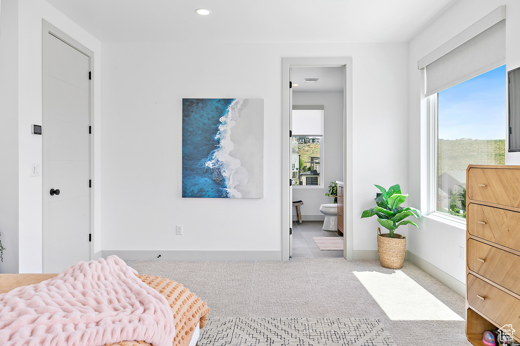 Bedroom featuring carpet floors, recessed lighting, ensuite bathroom, and baseboards