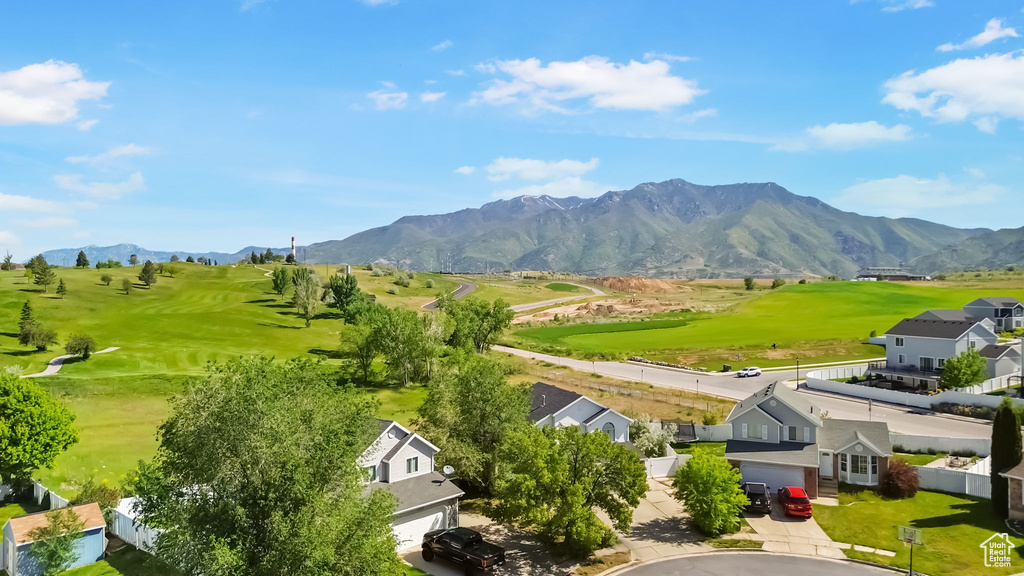 Mountain view with nearby suburban area and a local golf course