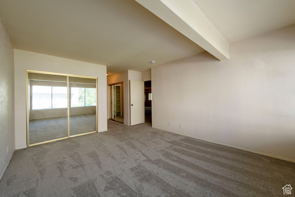 View of carpeted spare room