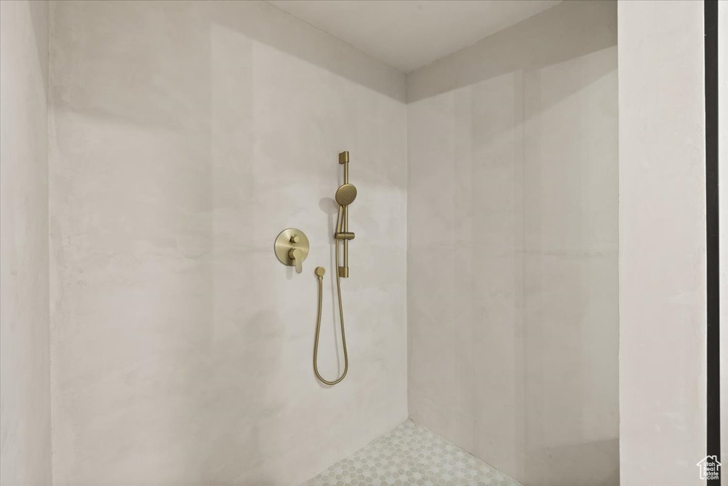 Bathroom with tiled shower