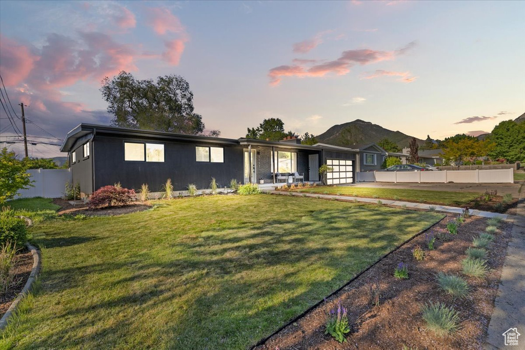 Single story home featuring a garage