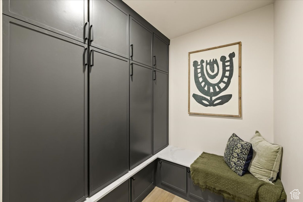 Mudroom featuring light wood finished floors