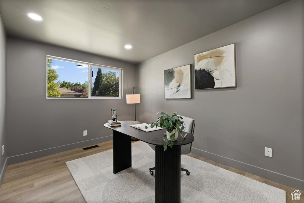 Office with baseboards, wood finished floors, and recessed lighting