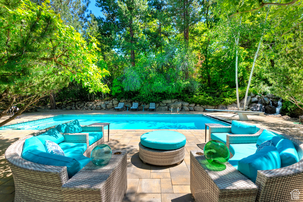 Swimming pool featuring a patio