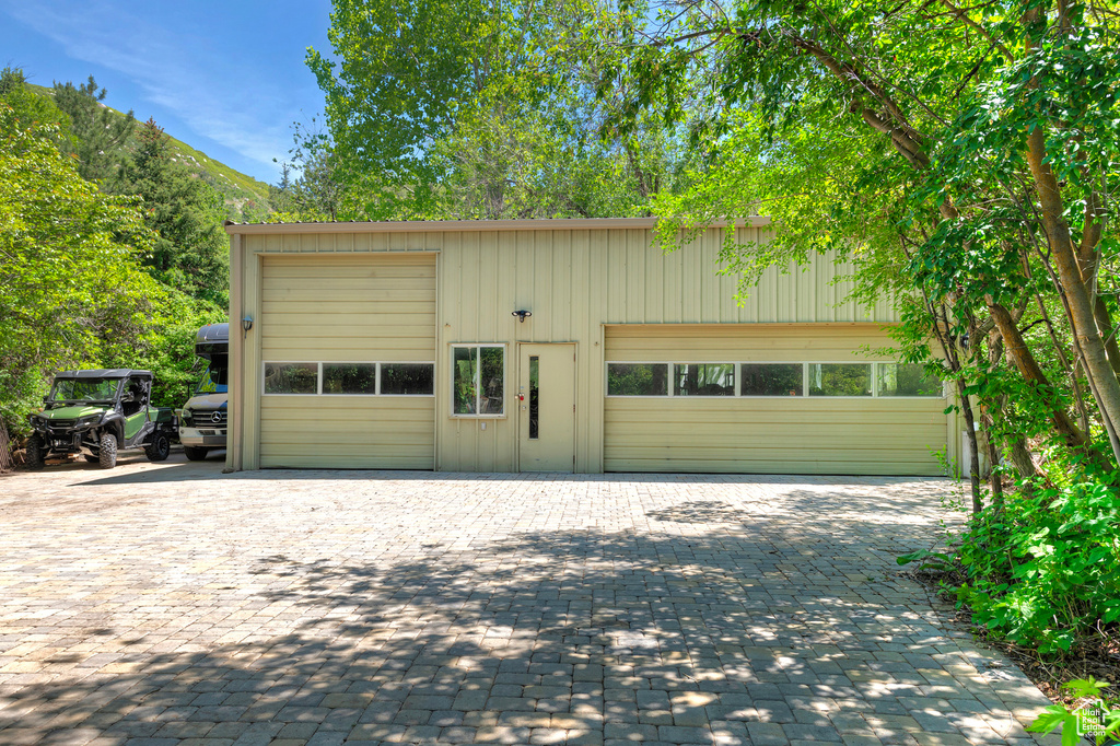 View of front of house featuring an outbuilding