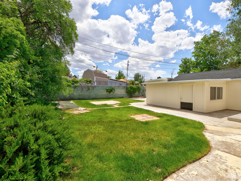 View of yard with a patio