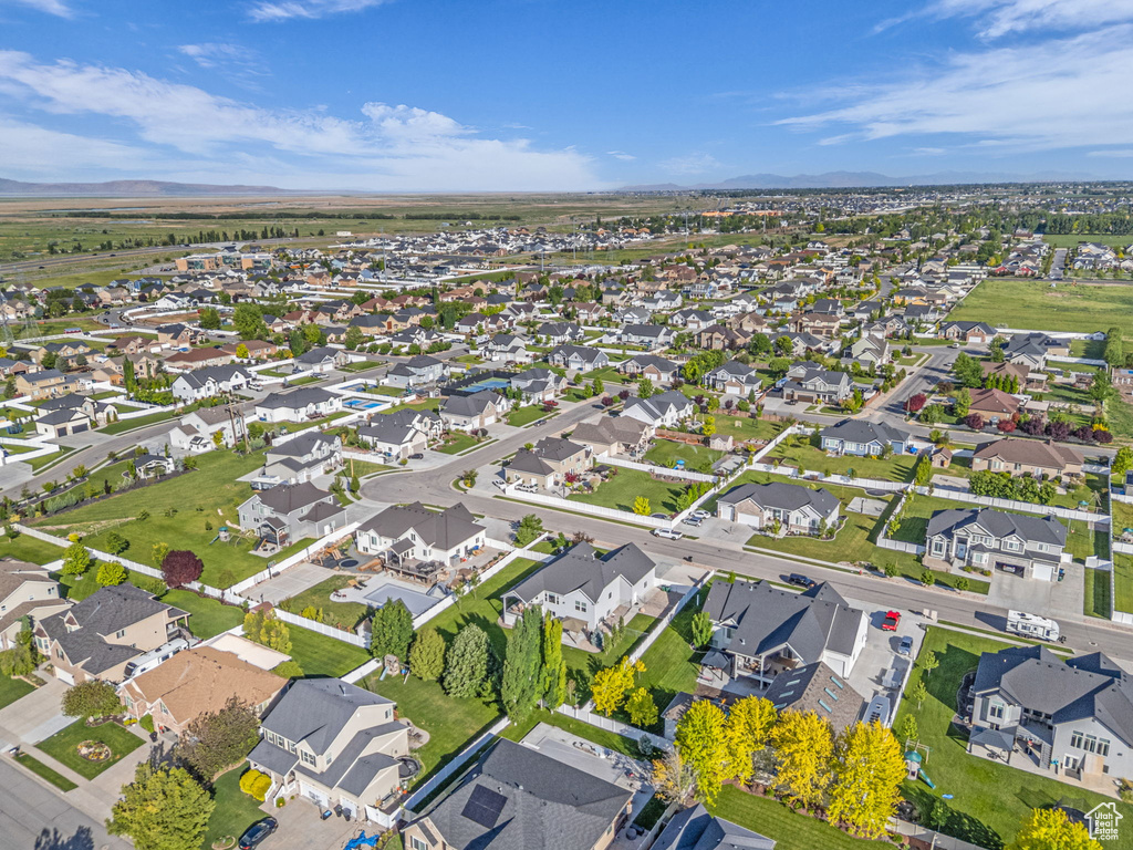 View of property location with a mountainous background and nearby suburban area