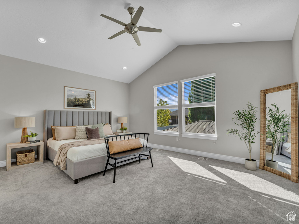 Carpeted bedroom featuring vaulted ceiling, baseboards, recessed lighting, and a ceiling fan