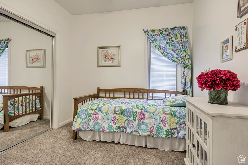 Bedroom with carpet flooring