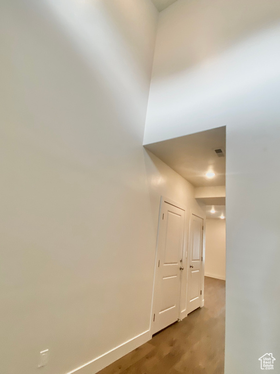 Corridor featuring baseboards