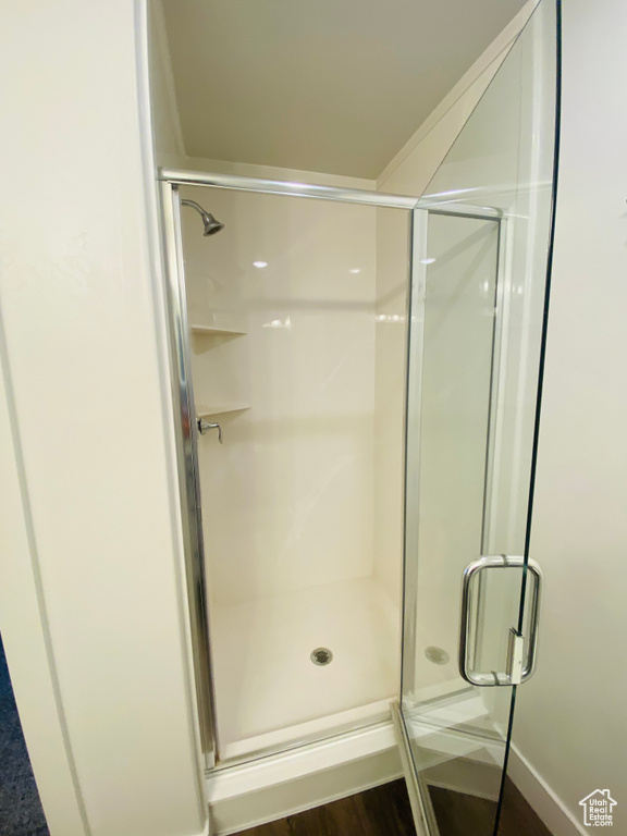 Full bath with a shower stall