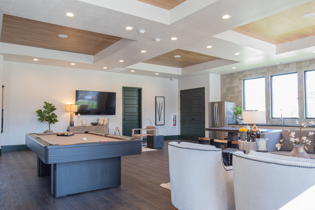Living room featuring a tray ceiling, wood ceiling, baseboards, dark wood-style floors, and recessed lighting