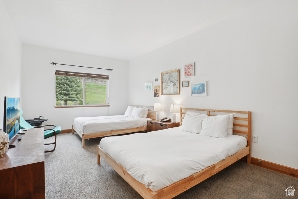 Bedroom featuring baseboards
