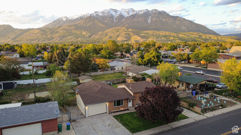 View of mountain backdrop with nearby suburban area