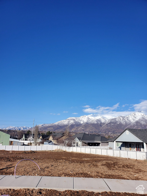 View of yard with a mountain view and a residential view