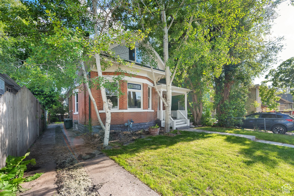 View of front of property with brick siding