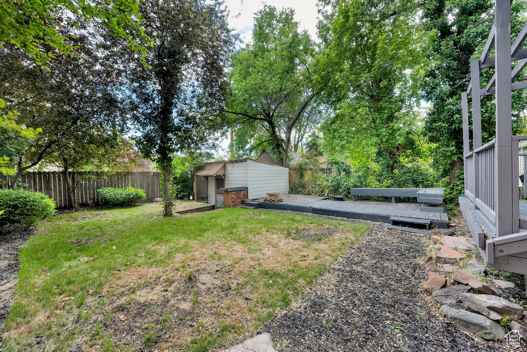 View of yard featuring a deck