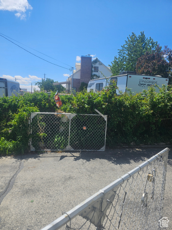 View of yard with a gate