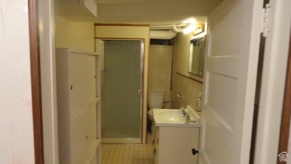 Bathroom featuring vanity and tile patterned floors