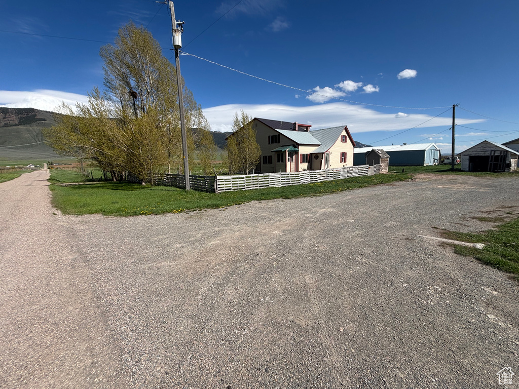 View of property exterior featuring driveway