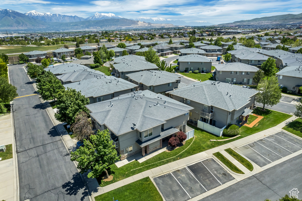 Aerial view of residential area with a mountainous background