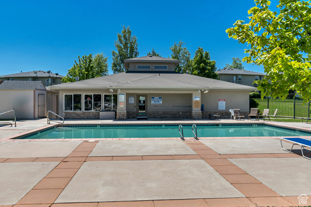 Community pool featuring a patio area