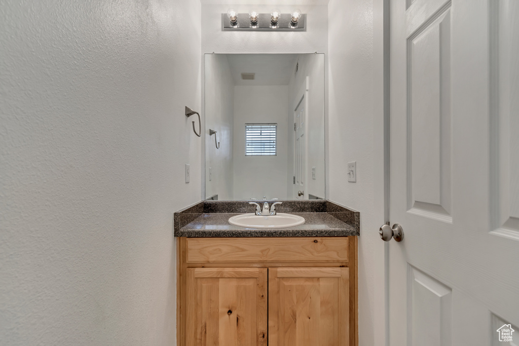 Bathroom featuring vanity