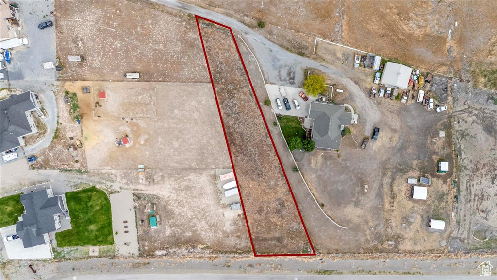 Aerial overview of property's location with property parcel outlined