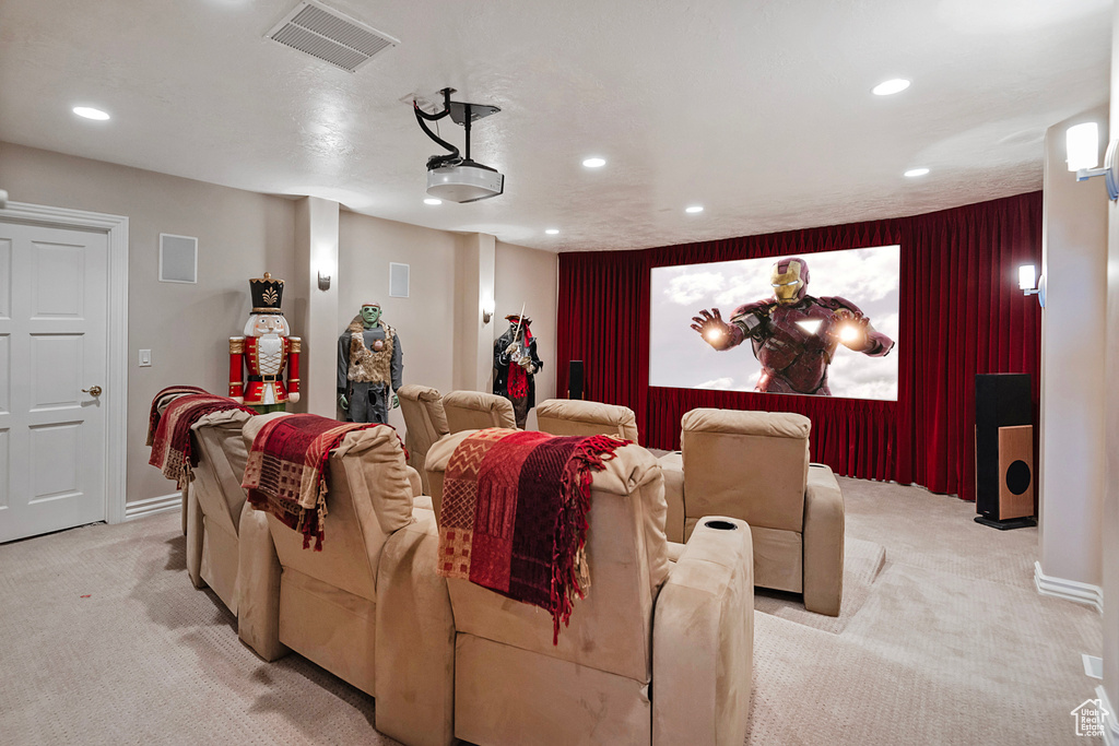 Cinema featuring light carpet, recessed lighting, and baseboards