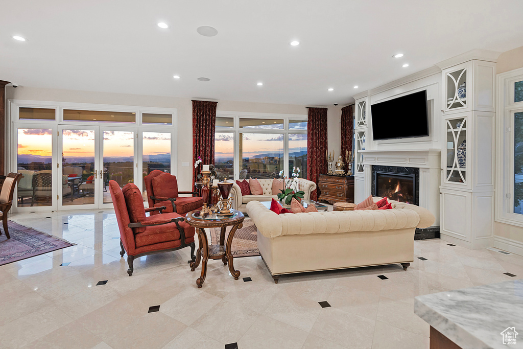 Living area featuring a high end fireplace and recessed lighting
