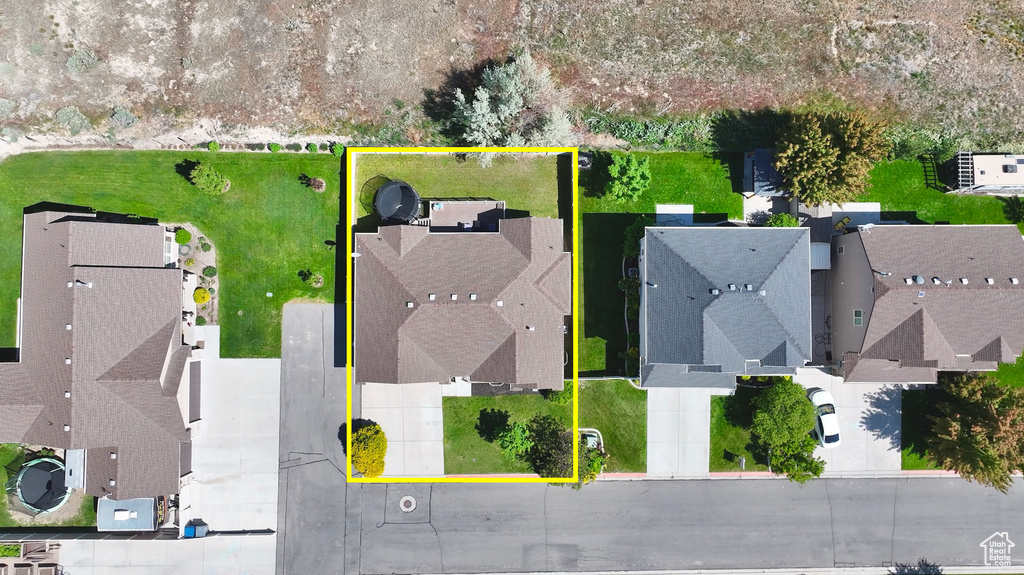 Aerial perspective of suburban area with property parcel outlined
