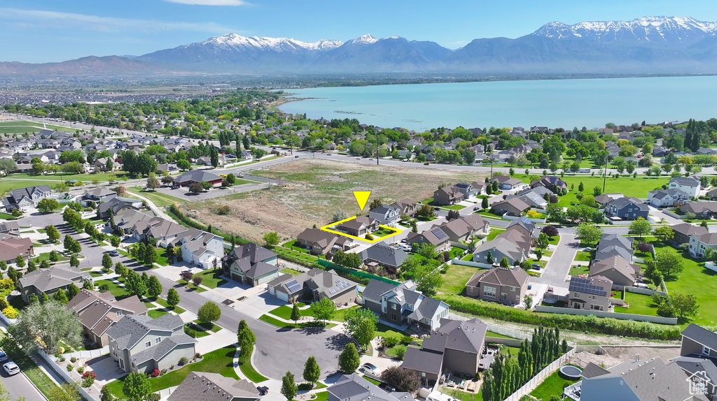 Aerial view of residential area with a water and mountain view