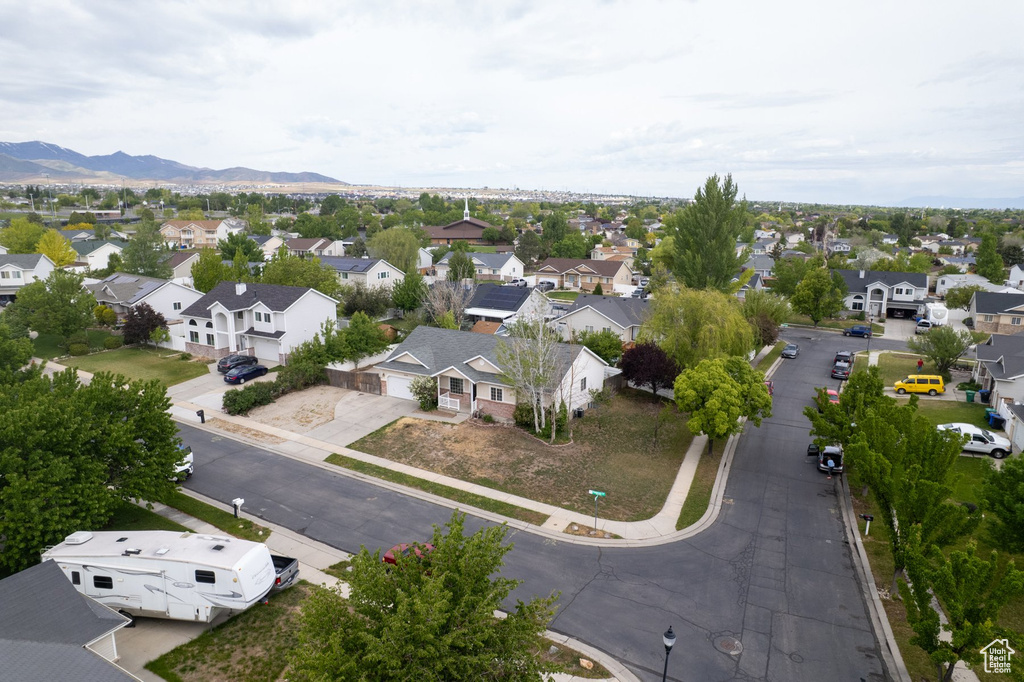 Aerial view of residential area with a mountain backdrop
