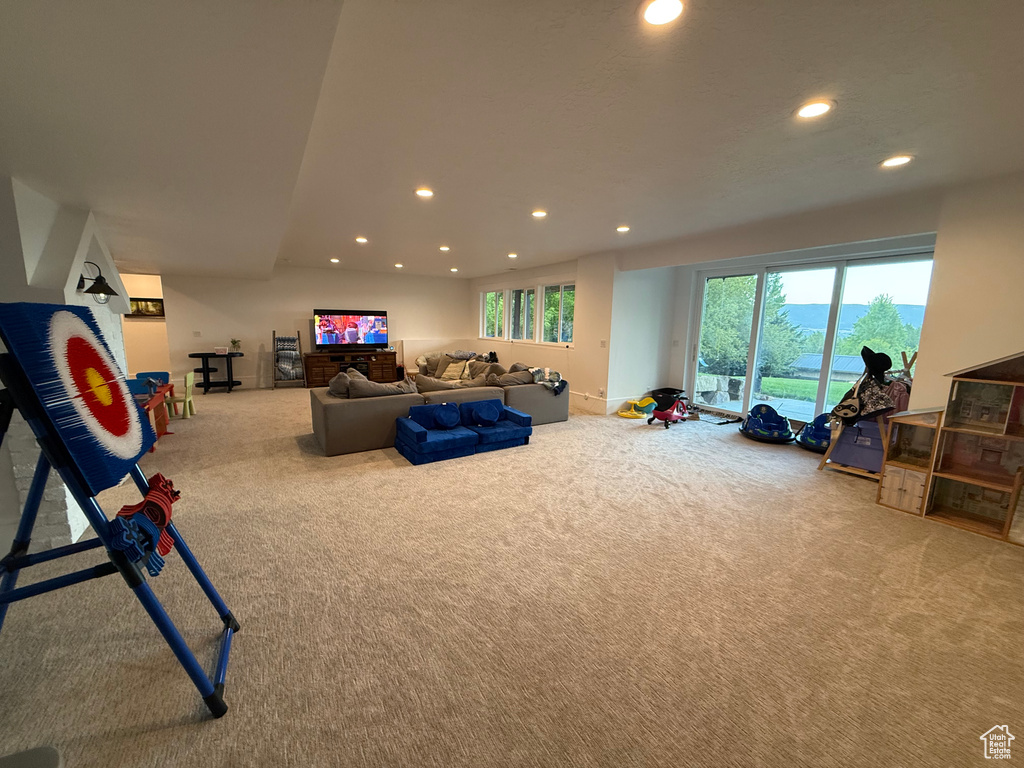 Recreation room featuring recessed lighting and carpet