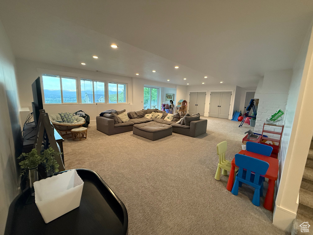 Living room featuring carpet and recessed lighting
